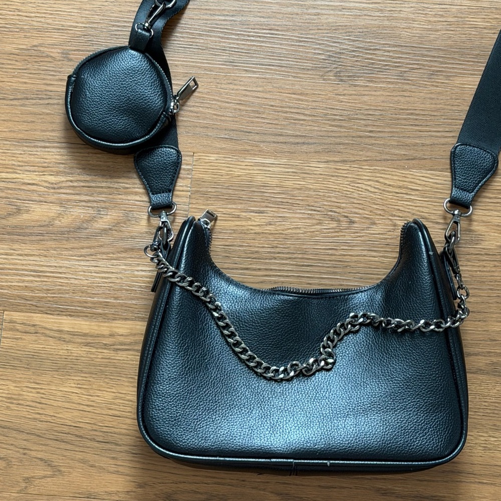 Black cross body bag with silver chain